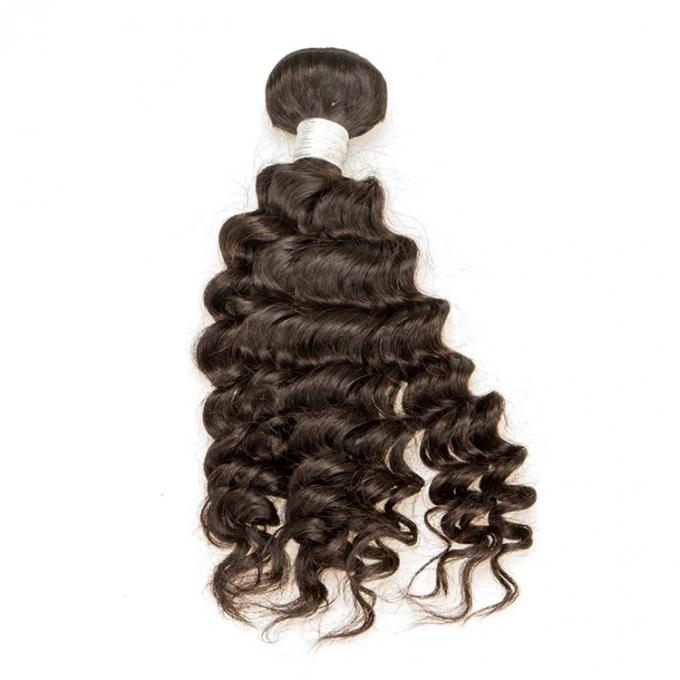 O cabelo brasileiro cru 3 encaracolados grandes materiais da extensão do cabelo humano do Virgin empacota uma cabeça