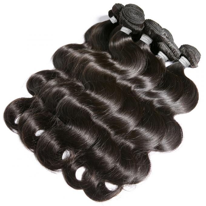 Da cor pura do preto 1B de 100% o cabelo humano brasileiro empacota extensões do cabelo molhado e ondulado