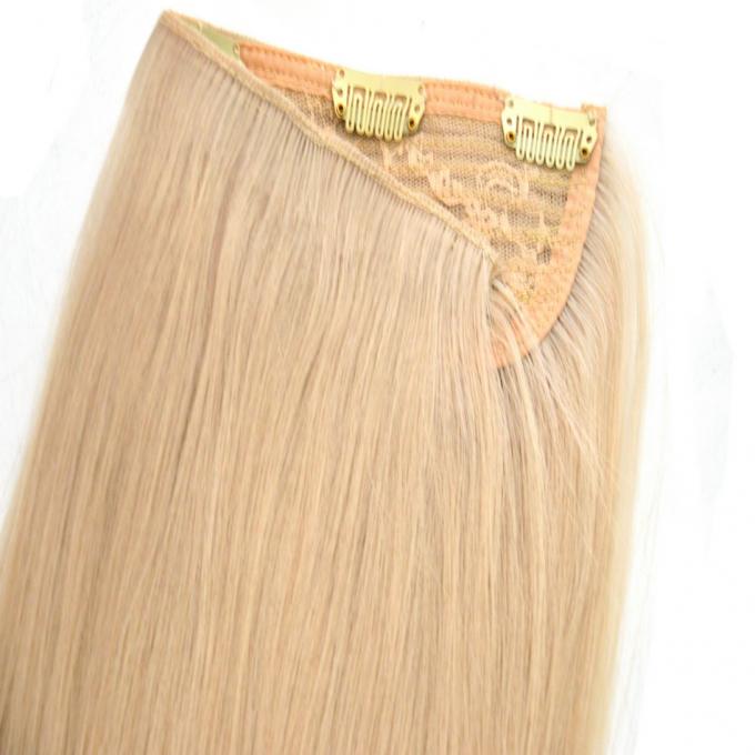 Um grampo longo da parte no cabelo humano das extensões do cabelo uma cor completa de 100 gramas